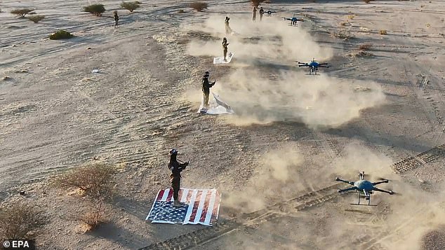 The Houthis Media Center also shared images of militants flying drones flying American flags