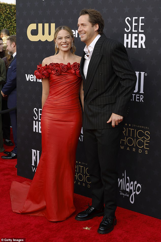 The couple put on a loving show as they hugged and smiled on the red carpet