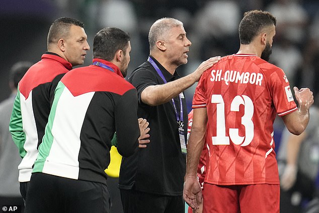 Makram Daboub addresses his players after the defeat at the Education City Stadium