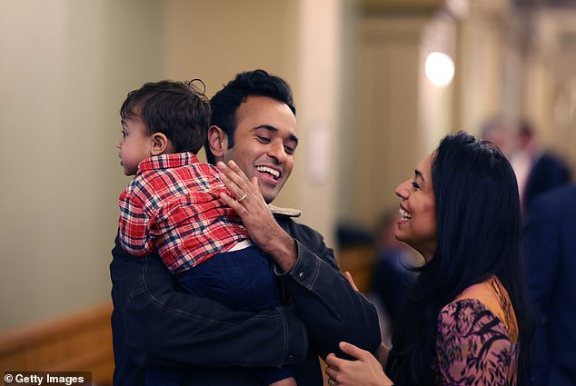 Vivek and Apoorva Ramaswamy with son Arjun, one, attend a rally at the Iowa State Capitol Building on January 10 for a rally against the construction of a CO2 pipeline