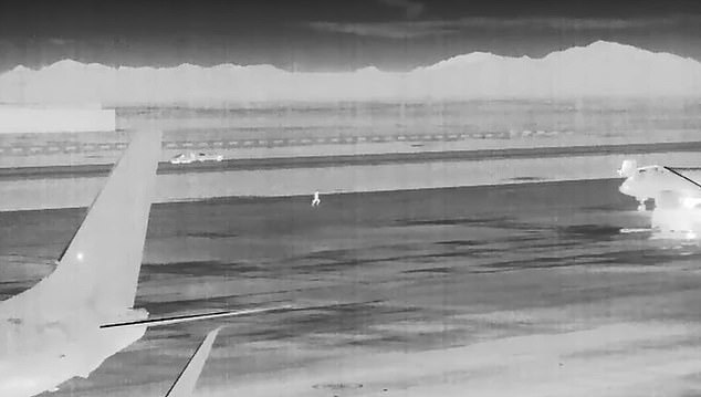 Efinger somehow made it to the tarmac, with video from a thermal imaging camera showing him approaching a slowly taxiing Delta Airlines plane.  He runs towards the plane, but the video cuts out before he reaches it