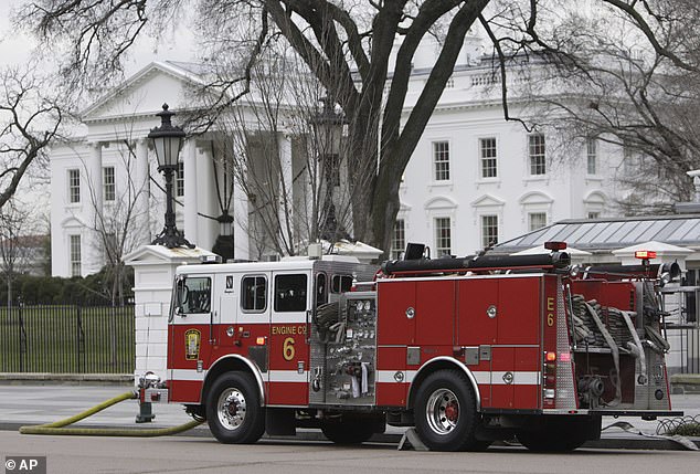 A fire truck is parked outside the White House in Washington, December 19, 2007