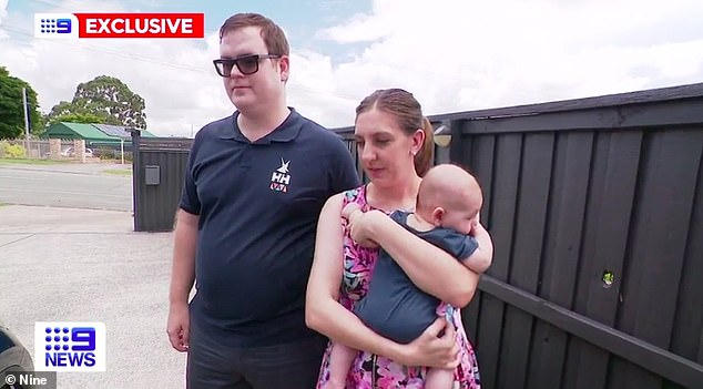 The baby boy was freed by paramedics to his parents' relief, but they are now too scared to ever put him in the car again