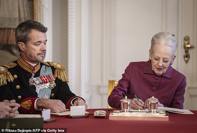 The former monarch signed her historic abdication papers alongside her son and grandson Prince Christian, 18, present at Christiansborg Palace in Copenhagen