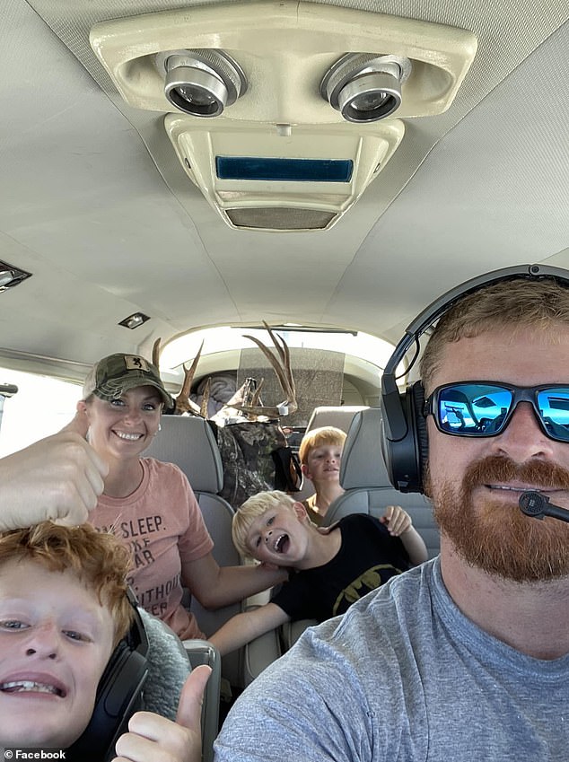 Smith with his wife Andrea Smith and his three young sons returning from a hunting trip