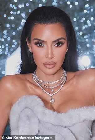 The social media star from Brazil thinks she already had a 'genetic' resemblance to Kim (pictured) before she went under the knife