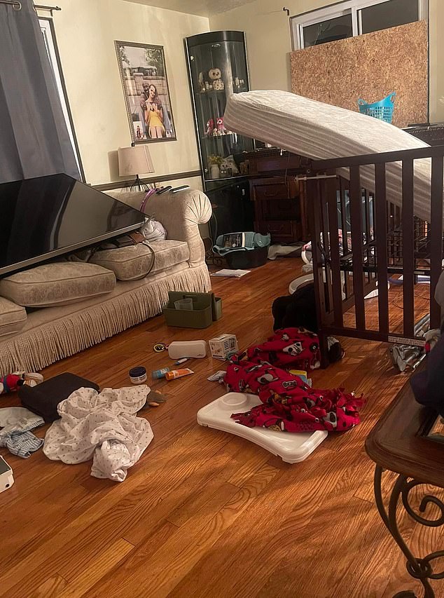 The baby was sitting on a swing when dozens of officers burst through the door of the Parley Avenue home last Wednesday, reportedly throwing two grenades and seriously injuring the baby.