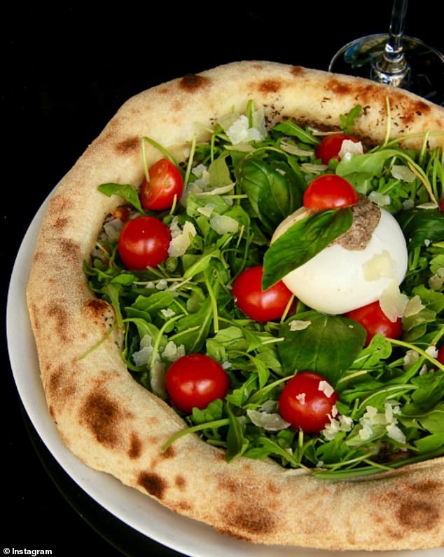 Although French Totti does not have puffed bread on its menu, it does have garlic-olive oil bread on its menu.  It also offers antipasti dishes such as burrata