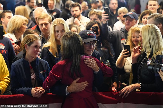 Presidential hopeful NIkki Haley hugs supporter during her Iowa caucus night event at the West Des Moines Marriott.  Haley had surpassed Florida Governor Ron DeSantis for second place in some recent Iowa polls, but finished a close third