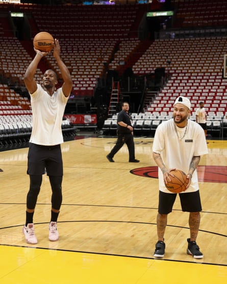 Butler shoots with Neymar during a shootout in Miami during last year's NBA Finals.