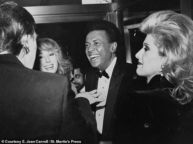 Donald Trump responded to a rape accusation by writer E. Jean Carroll (second from left) by saying he never met her.  A photo from 1987 shows them together at a party