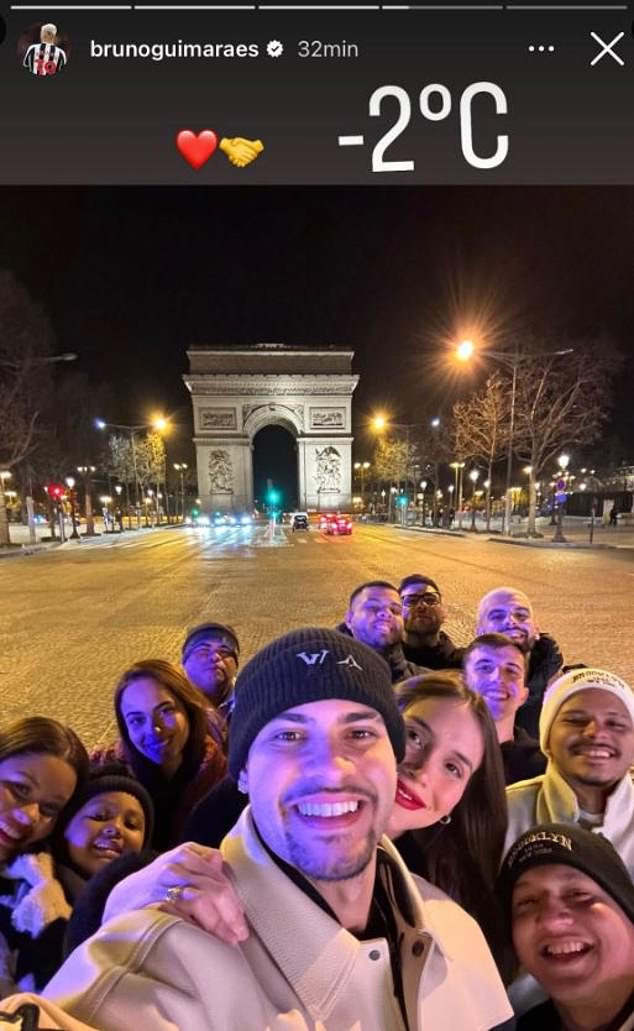 Guimaraes - who has been linked to Paris Saint-Germain - posed under the Arc de Triomphe