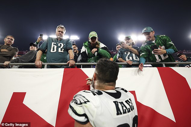 Kelce walked over to see his wife Kylie and father Ed in emotional scenes in Tampa Bay