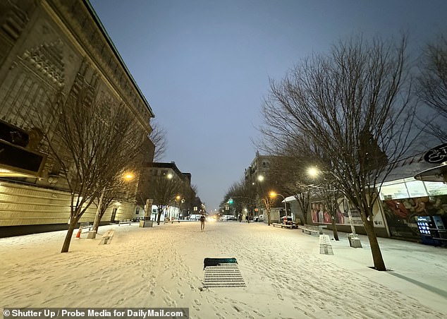 General view of snow in Manhattan's Washington Heights on Tuesday morning