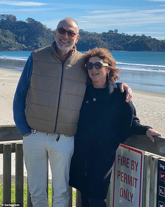 It is understood that while Mr Rothfield was away, one of his daughters was confronted by the gang at their Armadale home at around 2.20am on Tuesday (he is pictured with his wife Melissa)