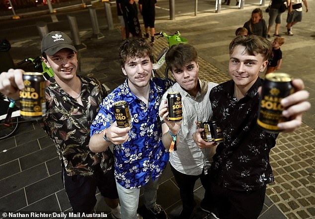 Rhyce, Sabian, James and Will cracked open cans of Hard Solo along the Surfers Paradise strip during the festivities