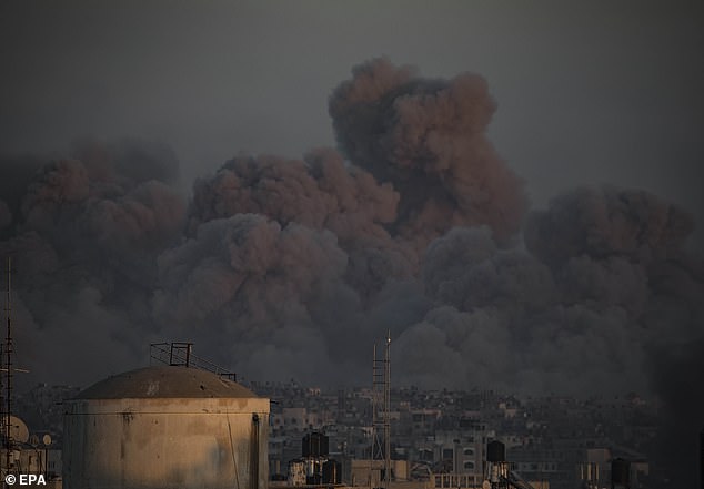 Smoke rises after Israeli airstrikes in Khan Yunis, southern Gaza Strip, January 16, 2024