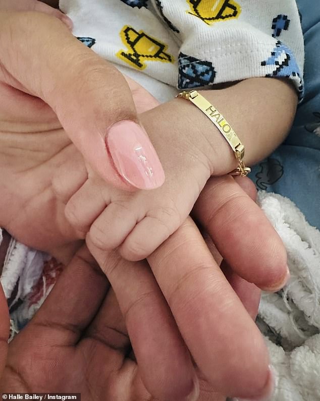 In the first week of the new year, Halle revealed she had welcomed a baby, posting a photo of her holding her son's tiny hand as he wore a gold bracelet with his name engraved on it.