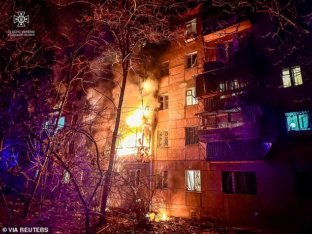 A residential building burns after being hit by a Russian drone strike, amid the Russian attack on Ukraine, in Odesa, Ukraine, January 17, 2024