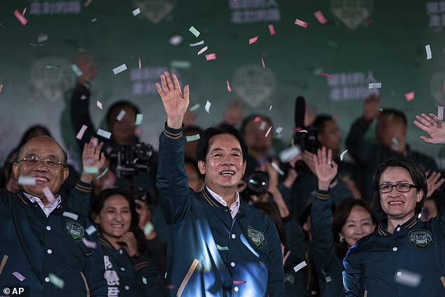 Taiwanese Vice President Lai Ching-te, also known as William Lai, left, celebrates his victory with running mate Bi-khim Hsiao in Taipei, Taiwan, Saturday, January 13, 2024