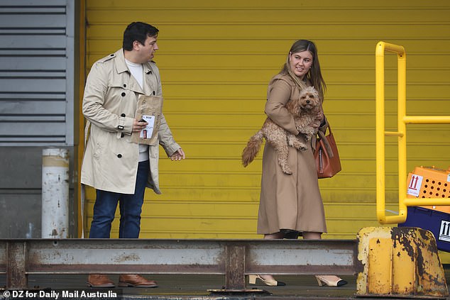 Ms Higgins and Mr Sharaz are seen in airport quarantine on December 21