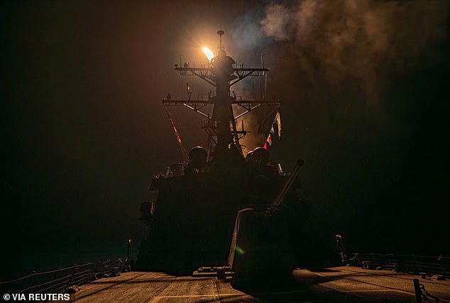 A missile is launched from a warship during the US-led coalition operation against military targets in Yemen targeting the Iran-backed Houthi militia on January 12