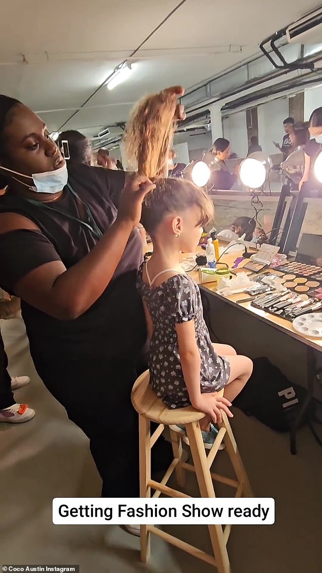 She also captured images of Chanel looking like a true professional as she got her hair and makeup done backstage