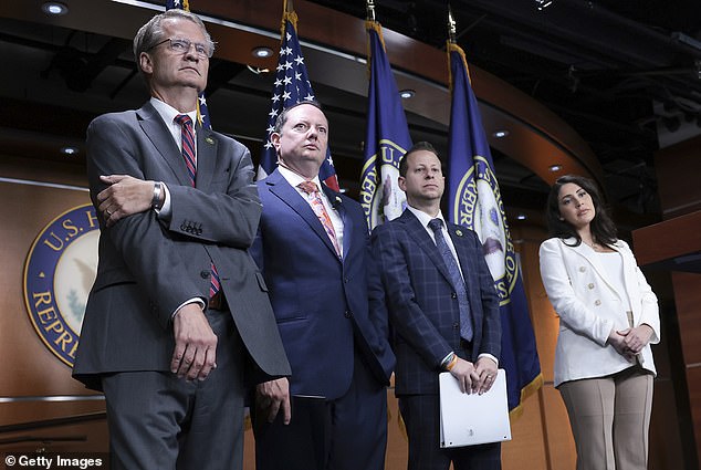 Above, Rep. Tim Burchett (left) next to fellow 