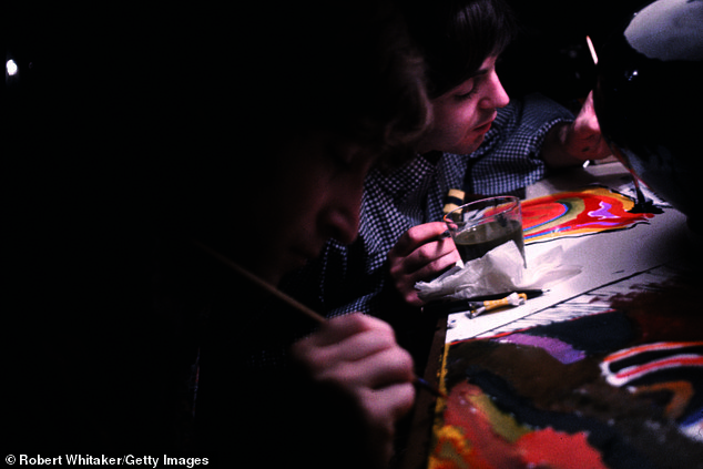 John Lennon and Paul McCartney spend the hours between shows painting at the Tokyo Hilton during the Beatles' Asian tour, June 28, 1966