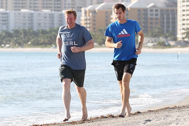 Dickson was a hugely respected journalist, by readers and players alike.  Here he is seen with Murray along a beach in Miami