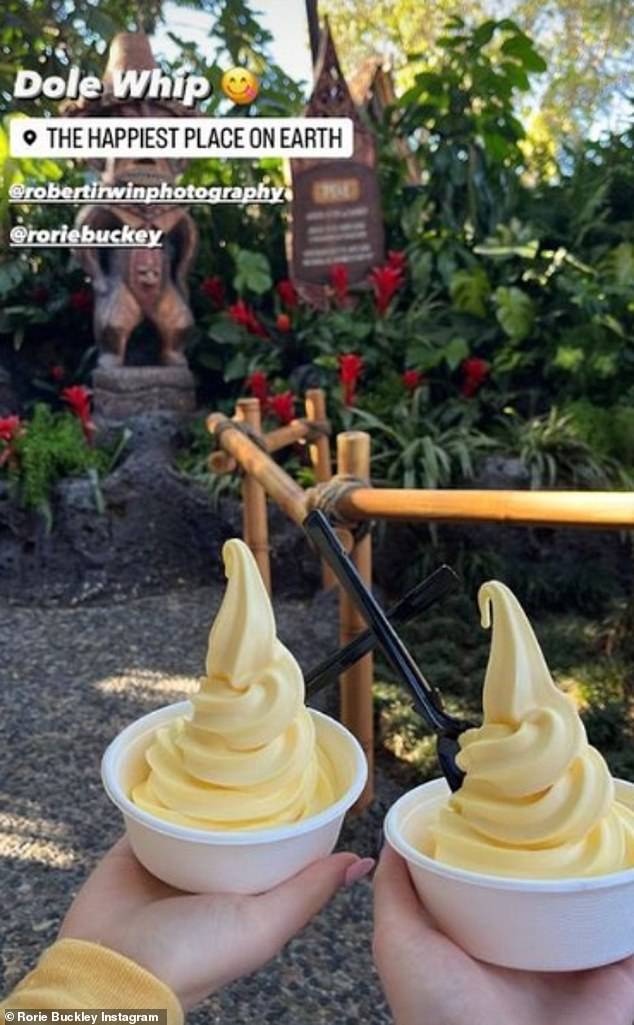 Rorie also shared a photo of the matching yellow ice creams they bought and captioned it with a few sweet words: 'The happiest place on earth'