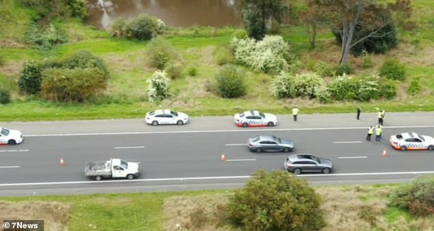 The photo shows police officers searching for Mr Howard in October