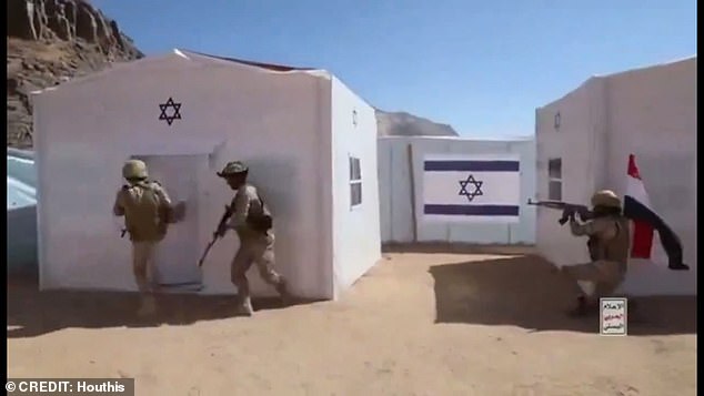 The Houthi soldiers carry out mock exercises against fake Israeli forces