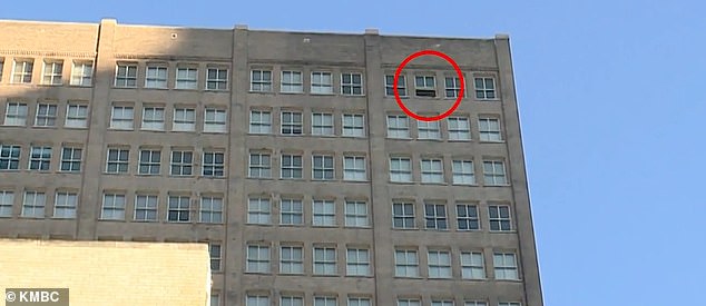 The 17th floor window from which Grayson supposedly falls is visible.  A passerby found the boy's dead body in the alley around noon