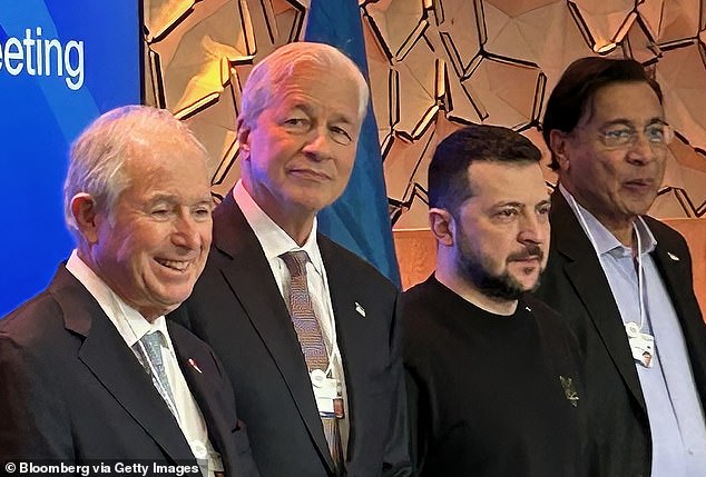 Dimon (center left) meets with Ukrainian President Volodymyr Zelensky (center right) on the opening day of the World Economic Forum in Davos, Switzerland