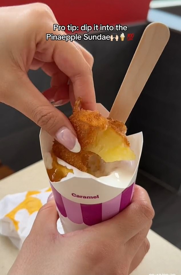 A viral trend has emerged of Aussies dipping their beignets into their pineapple sundaes (pictured is a social media user dipping their beignets into a sundae)