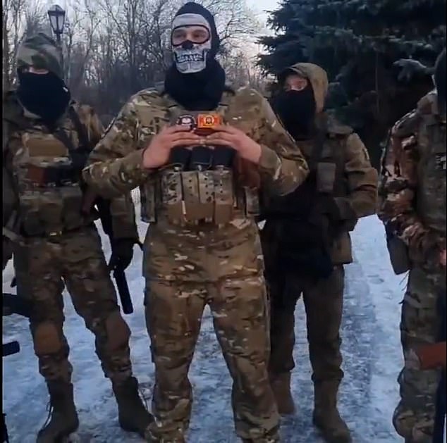 One of the Russian soldiers wears a balaclava with a skull as the group vows to fight back against any attacks from their own side