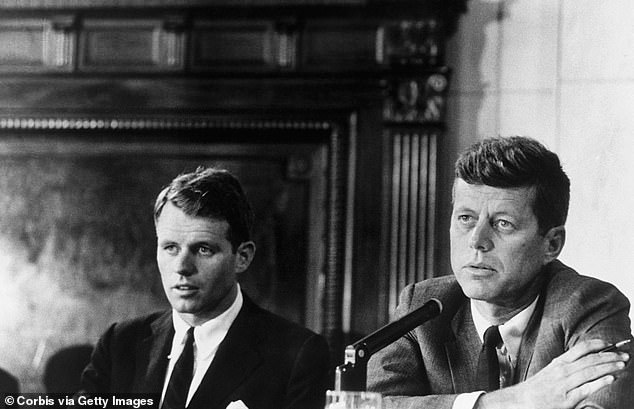 RFK Jr is the son of Robert F Kennedy (left), who was attorney general and senator before being shot in 1968, and nephew of President John F Kennedy, assassinated in 1963