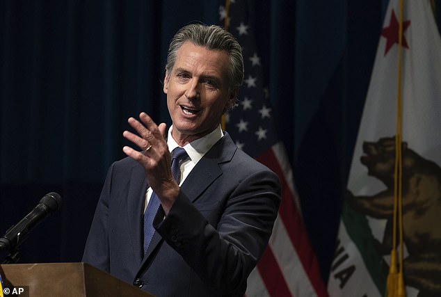 California Governor Gavin Newsom discusses his proposed state budget for the 2024-2025 fiscal year during a press conference in Sacramento, California