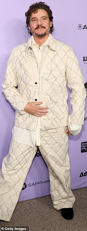 The 48-year-old heartthrob from The Last Of Us cut a dashing figure in a beige jacket and trousers combo with a complementary off-white top