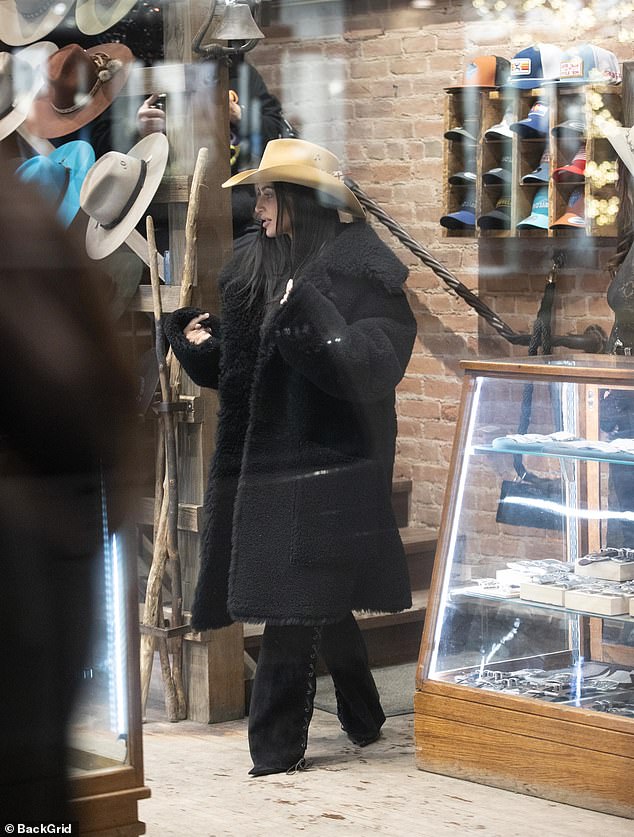 But Kim didn't seem bothered by her critics as she shopped at Kumo Sabe