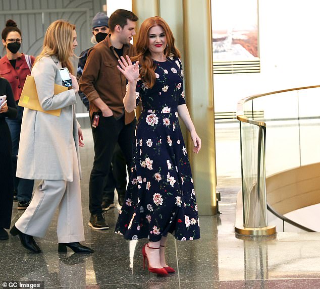 Earlier in the day, Isla was the epitome of chic as she arrived at NBC studios for The Today Show in a black floral print dress