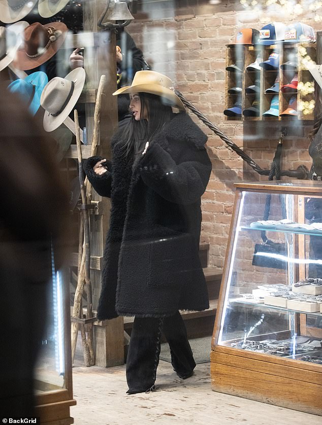 Her older sister Kim was also spotted at the Kemo Sabe store.  The raven haired beauty was dressed in a fluffy black fleece jacket with black suede trousers with dangling stitching down the sides of her legs