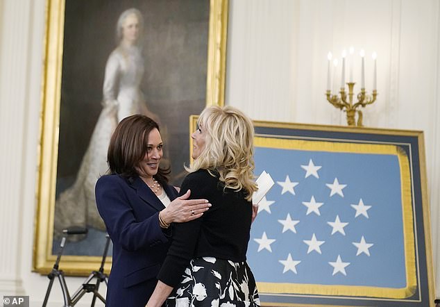 First Lady Jill Biden is greeted by Vice President Kamala Harris before a Medal of Honor ceremony for retired U.S. Army Colonel Ralph Puckett in the East Room of the White House, Friday, May 21, 2021