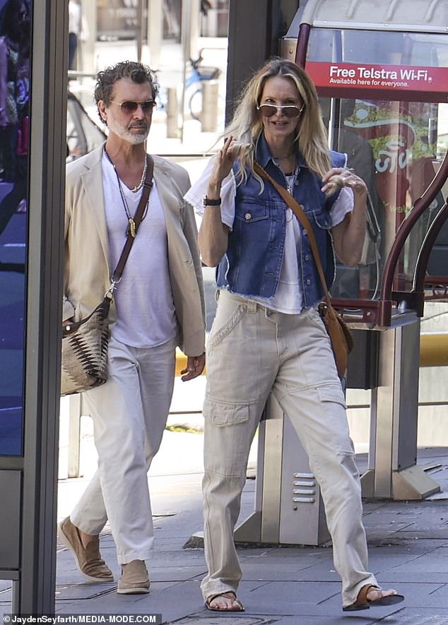 The couple looked more in love than ever as they went shopping at Sydney's Pitt Street Mall on Friday