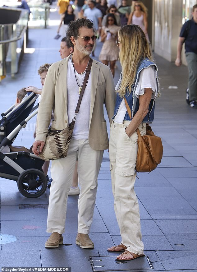 The 59-year-old and her boyfriend held hands as they walked into the Ralph Lauren store together to browse