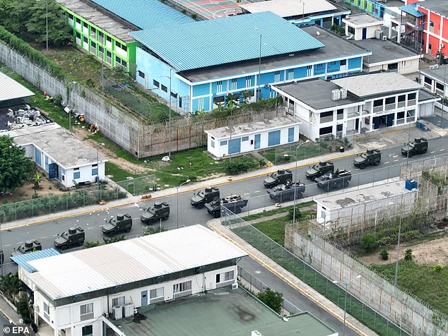 Military vehicles arrive at the prison on Thursday ahead of the operation