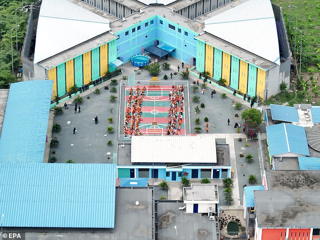 Prisoners are seen on a basketball court in Litoral prison on Thursday