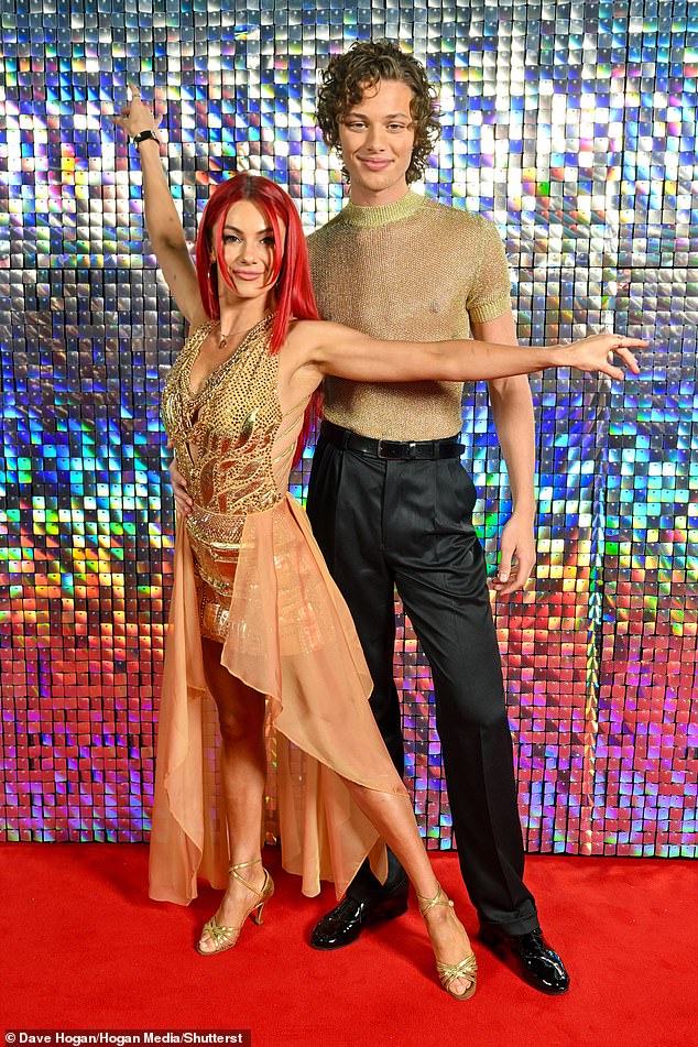 The pair pose for a photo in their glittery costumes during the dress rehearsal of Strictly Come Dancing - Live UK Tour yesterday