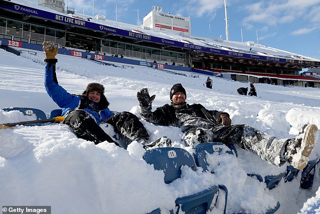 But fans made the most of the conditions on match day and took to the snow before kick-off